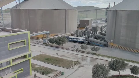 Panoramic View of Lafarge Holcim Cement Plant and Silos in Algeria 4K. 動画素材 331670410