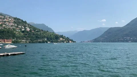 Panoramic view of Lago di Como lake. Motion of speed boat. Lake Como, Italy. Stock Footage 159570089