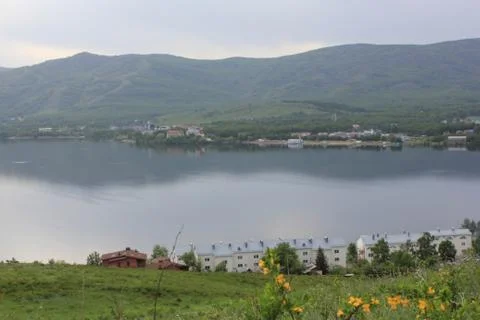 Panoramic view. A lagoon with a clean mountain lake in the midst of majestic Stock-Fotos
