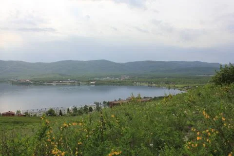 Panoramic view. A lagoon with a clean mountain lake in the midst of majestic Stock-Fotos