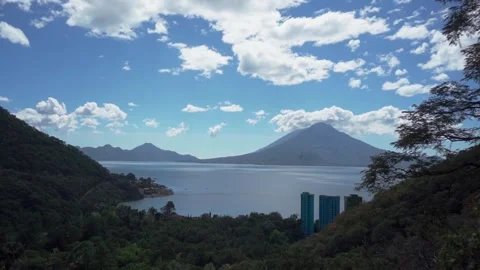 Panoramic View of Lake Atitlan and Volcanoes Stock Footage 293861163