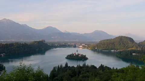 Panoramic View of Lake Bled with Island Church and Julian Alps, Slovenia Stock Footage 335469844