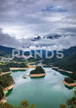 Panoramic view of lake of Centro Cadore in the Alps in Italy, Dolomites, near Stock Photos