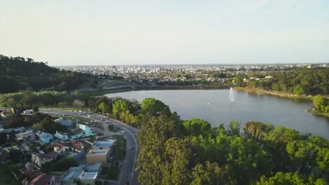 Panoramic view of a lake surrounded by city in Tandil, Argentina Stock Footage 217298747