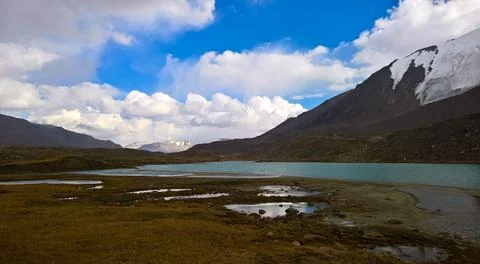 Panoramic view to lakes at Barskoon pass, river and gorge and Sarymoynak pass Stock Photos