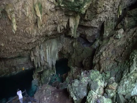 Panoramic view of large underground cave and lake with chrystal blue wate Stock Footage 71544310