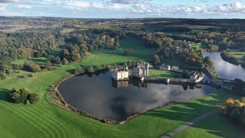 Panoramic View Of Leeds Castle On Moat Surrounded By Greenery In Kent, England Stock Footage 296169288