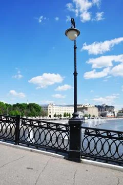 Panoramic view of the lighting pole, bridge parapet and bypass road. Stock Photos