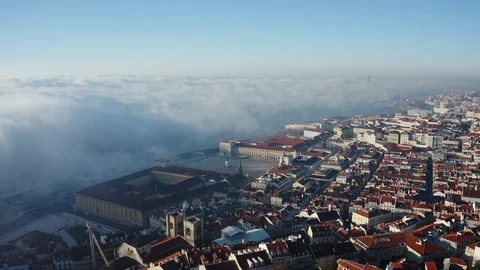 Panoramic view of Lisbon; old yellow rooftops in Portuguese capital Stock Footage 105294112