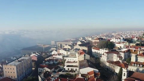Panoramic view of Lisbon; old yellow rooftops in Portuguese capital Stock Footage 105294394