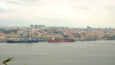 Panoramic view of Lisbon riverside in summer cloudy day Stock-Footage 99726016