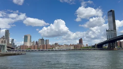 Panoramic view of Lower Manhattan skyline and Brooklyn Bridge. New York City Stock-Footage 337837854