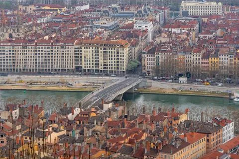 Panoramic view of Lyon's historic cityscape with a bridge over the Sane River Stock Photos