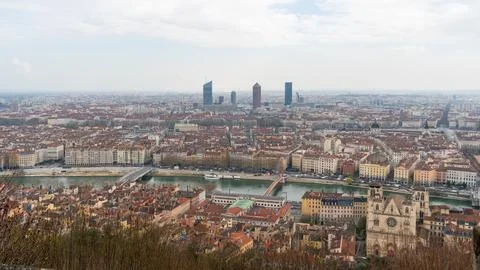 Panoramic view of Lyon's skyline with modern skyscrapers and historic buildin 스톡 사진