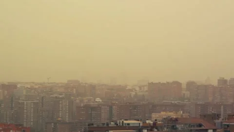 Panoramic view of Madrid covered by orange dust from Sahara desert Stock Footage 171892885