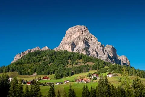 Panoramic view of magical Dolomite peak Sassongher, forests, valleys at Autum Stock Photos