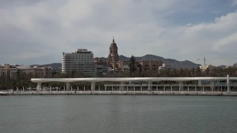 Panoramic view of Malaga embankment on a cloudy day Stock Footage 240097449