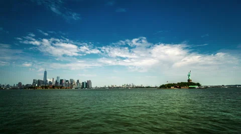The panoramic view of the Manhattan skyline and the Statue of Liberty Stock Footage 63890697