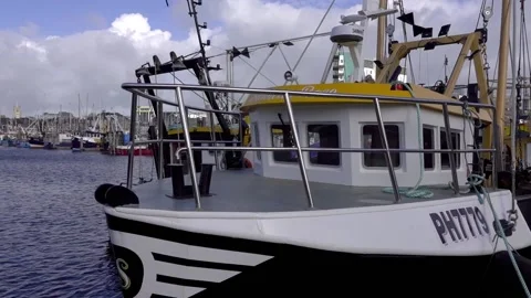 Panoramic view of marina looking over moored boat. Stock Footage 137859958
