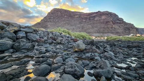 Panoramic view on massive sharp cliffs and mountains in village Valle Gran .. Stock Photos