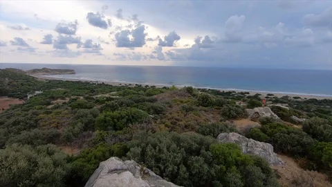 Panoramic view of the Mediterranean coast with a cloudy sky in the evening  Видео 119983569
