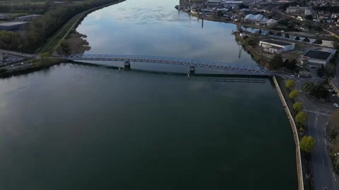 Panoramic view of a metal bridge over the Rhone river Stock Footage 248075720