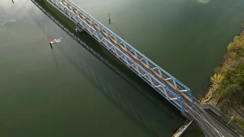 Panoramic view of a metal bridge over the Rhone river Stock Footage 248075798