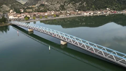 Panoramic view of a metal bridge over the Rhone river Stock Footage 248075931