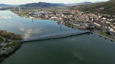 Panoramic view of a metal bridge over the Rhone river Stock Footage 248076148