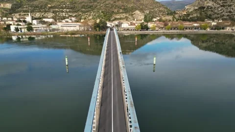 Panoramic view of a metal bridge over the Rhone river Stock Footage 248076162