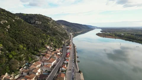Panoramic view of a metal bridge over the Rhone river Stock Footage 248076324