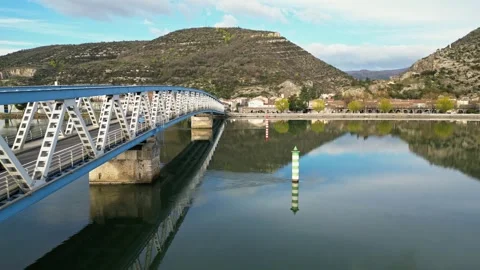 Panoramic view of a metal bridge over the Rhone river Stock Footage 248076418