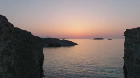 Panoramic view of Milos Island and the Aegean Sea, Greece, at sunset Stock Footage 220184491
