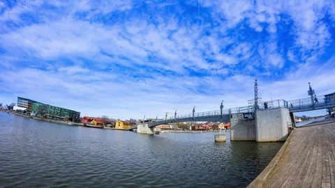 Panoramic View of Modern Bridge and Cityscape over Calm Water Video stock 310242994