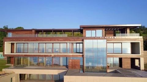 Panoramic view of modern hi-tech building nordic sunny drone footage aerial Video stock 77323689