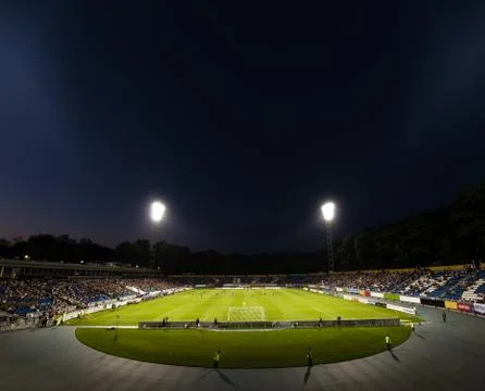 Panoramic view of modern stadium during football match Stock Photos