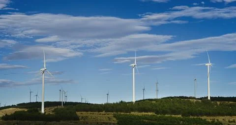 Panoramic view of modern windmills. Stock Photos