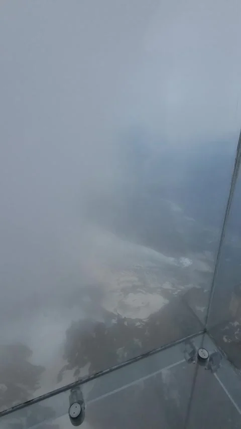 A panoramic view of Mont Blanc. A glass cabin on the observation deck in Aiguill Stock Footage 284453066