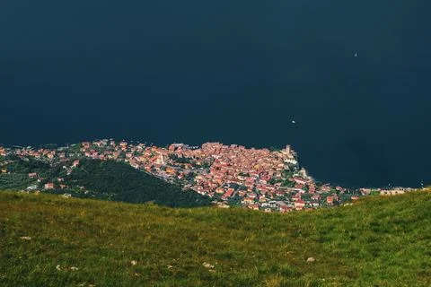 Panoramic view from Monte Baldo on the old town of Malcesine and Lake Garda.. Stock Photos