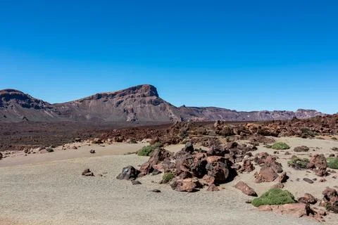 Panoramic view on mount Guajara, Roque de la Grieta in volcano Mount Teide .. Stock Photos