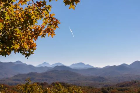 Panoramic view of the mountain chains of the Dinaric Alps seen from Goli Vr.. Stock Photos