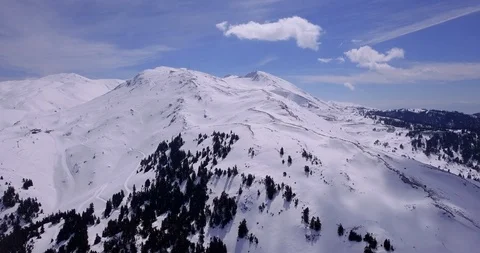 Panoramic view of mountain with freeride slopes, ski resort, down reverse reveal Stock Footage 93485234