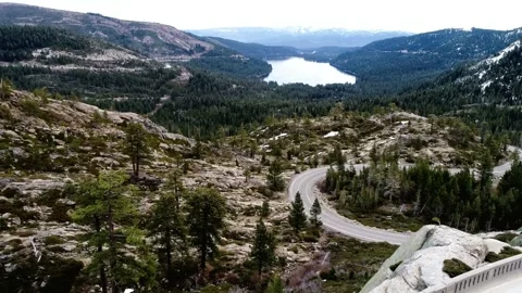 Panoramic View of Mountain Lake and Winding Road 스톡 동영상 311653801