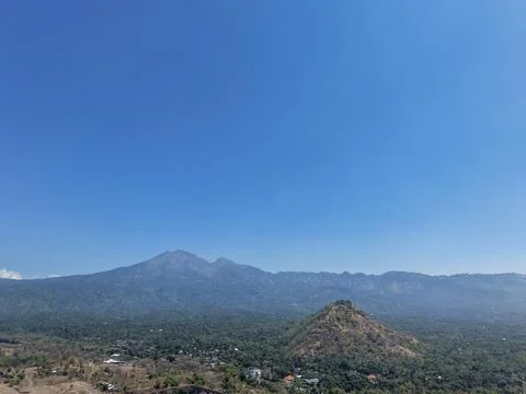 Panoramic View of Mountain Landscape and Forest Under Clear Blue Sky Stock Photos