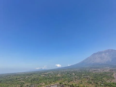 Panoramic View of Mountain Landscape and Forest Under Clear Blue Sky Stock Photos