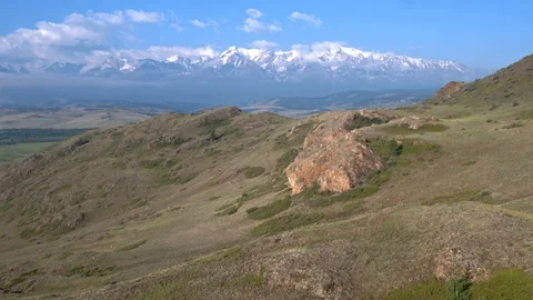 Panoramic view of the mountain range, clouds over the mountains. 2 episode. Stock Footage 125033396