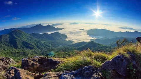 Panoramic View of Mountain Range with Sea of Clouds at Sunrise Stock Footage 310324522
