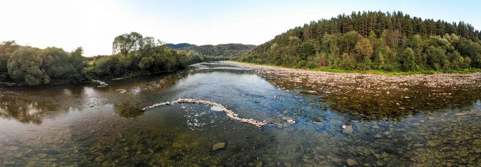 Panoramic view of mountain river stream wild landscape on scenic day in summer Stock Photos