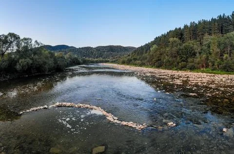 Panoramic view of mountain river stream wild landscape on scenic day in summer Stock Photos