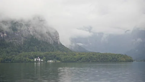 Panoramic view of mountain scenery with clouds and lake at Hallstatt in Austria Stock Footage 150415179